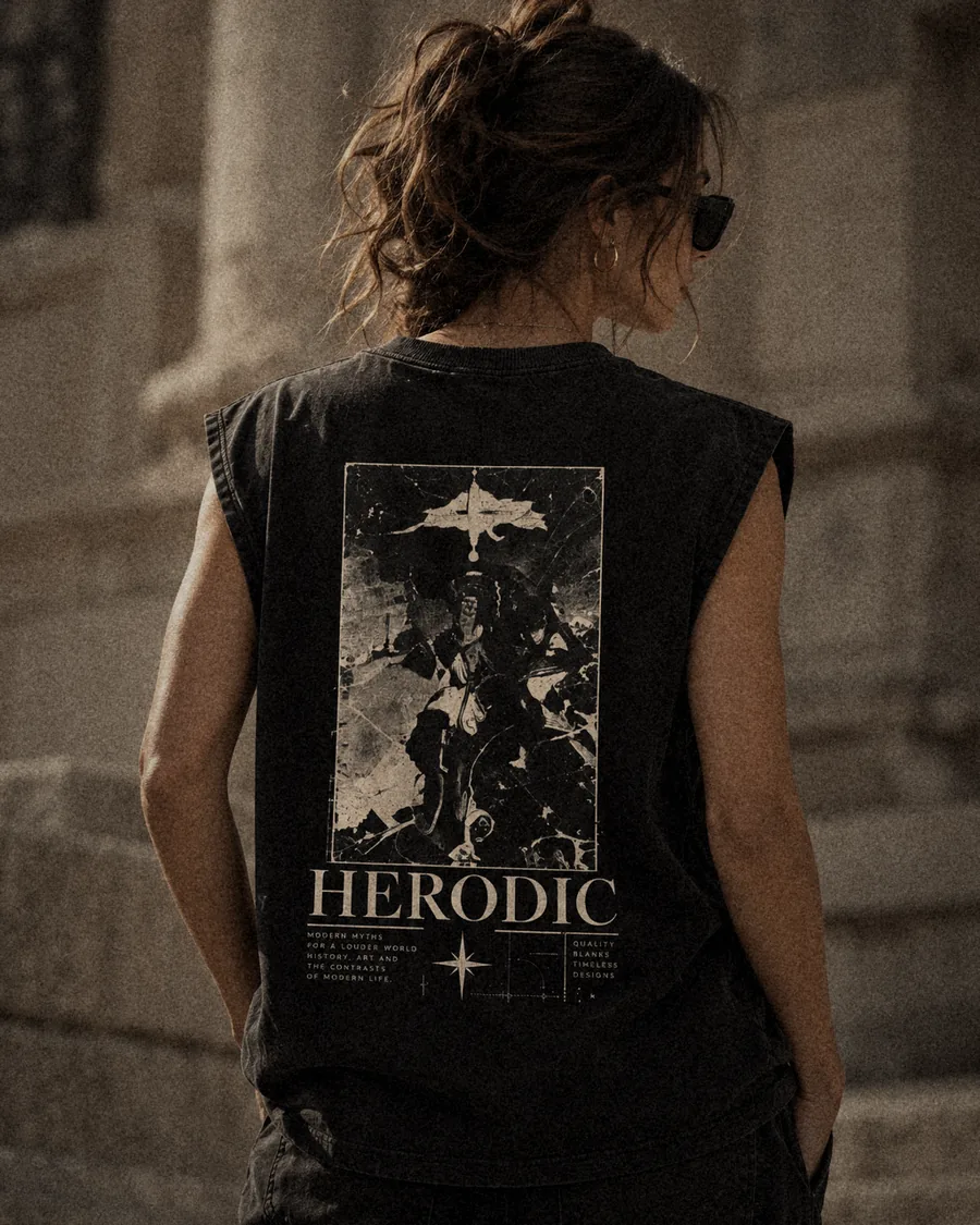 Model from behind in The Relic washed black boxy vest on old stone steps