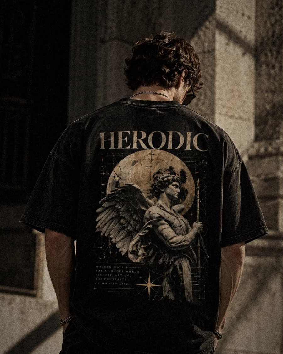 The Sentinel black tee back print: a winged statue before a golden moon